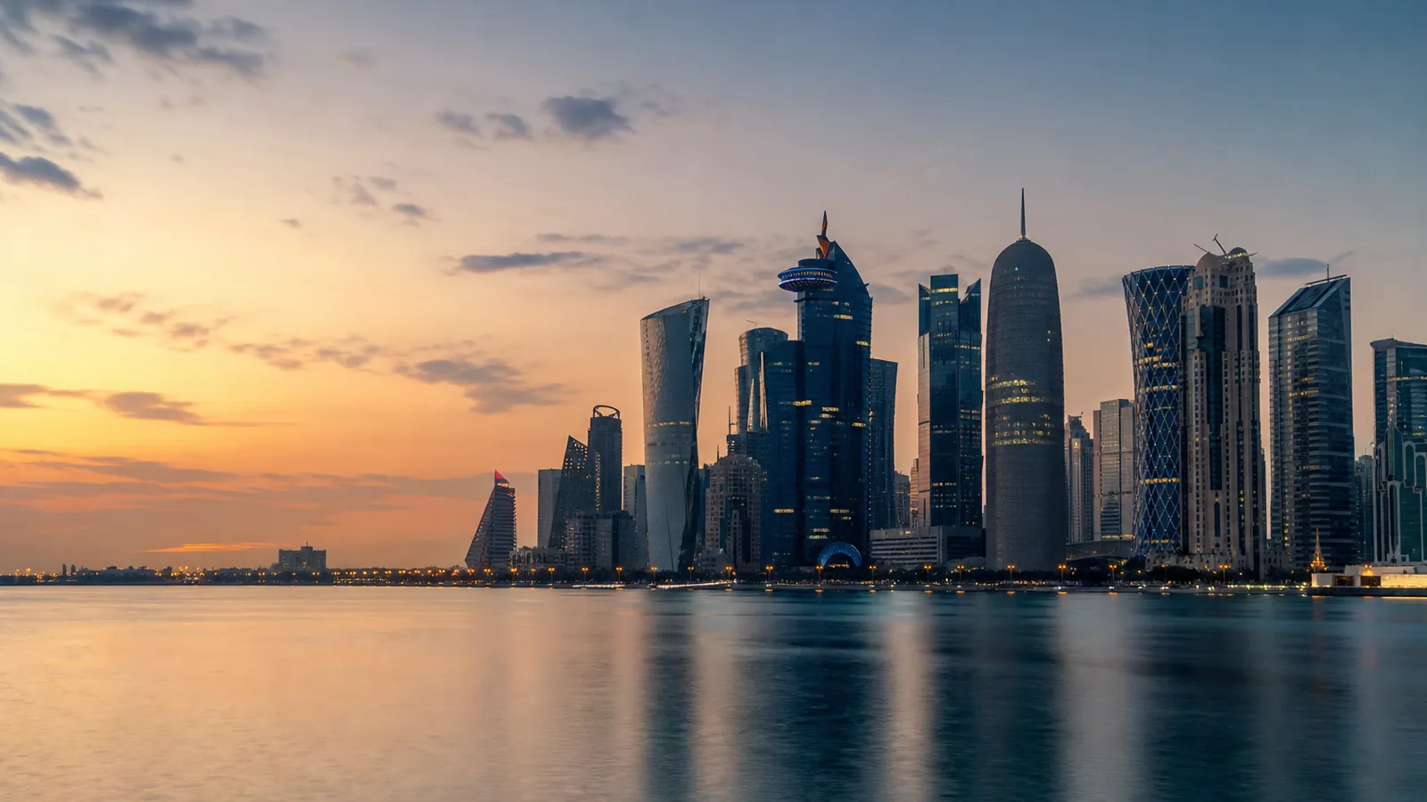 Doha skyline at dusk across the water — editorial travel photo for Qatar visit visa guide